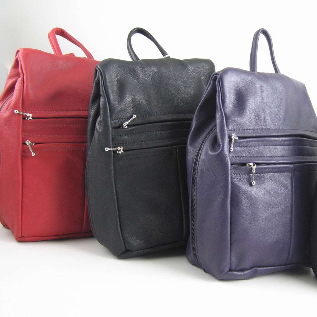 967 Purse size Leather Side Entry Backpack - Solid Colors