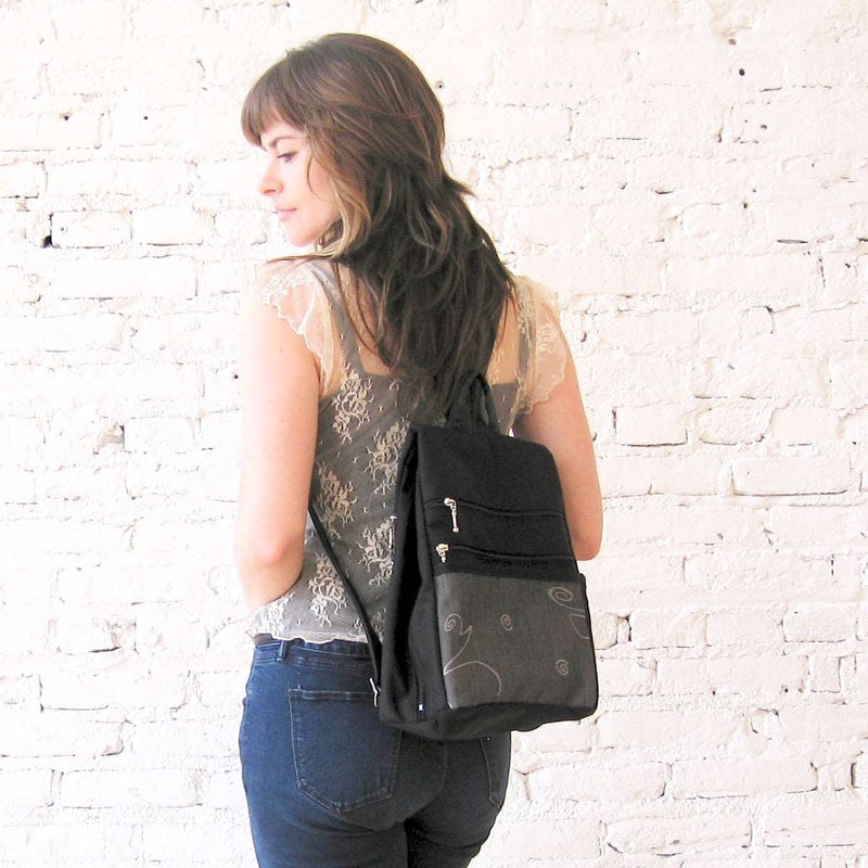 B968-BL Medium Side Entry Backpack in Black Nylon with Fabric Accent Pocket