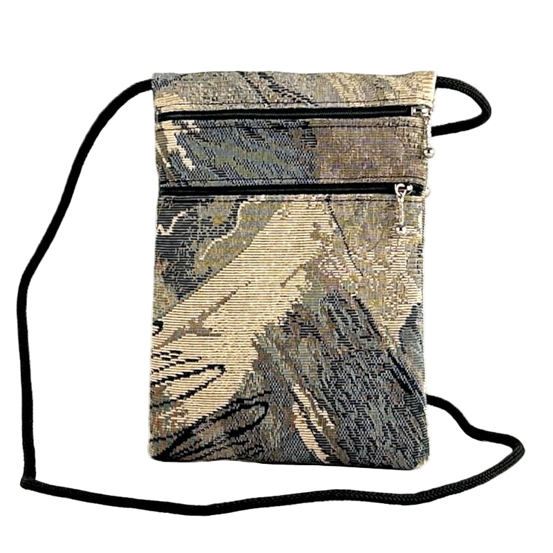 crossbody bag with muted abstract pattern